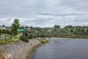 People enjoying the new Pennyburn bridge in Derry in May 2024