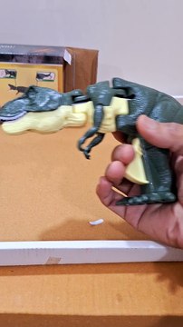 Gun Finger Innovative Telescoping & Swinging Features Plastic Design Engaging Sound Effects Lighting Tyrannosaurus Rex Head Swing Bite Trick Animal Gift for Boys and Girls Infant Toddler