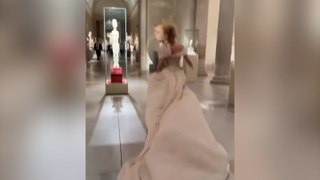 Pamela Anderson runs in heels and floor-length gown as she makes quick Met Gala exit