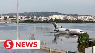 Aerial video shows submerged plane, runways flooded at Brazil airport