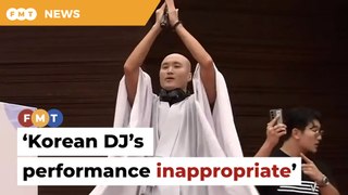 Buddhist group slams Korean DJ’s monk getup in KL club