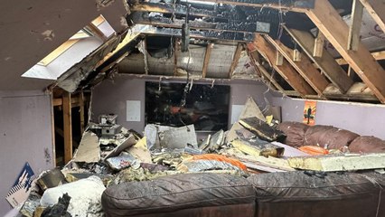 Family has lucky escape after lightning bolt sets house roof on fire