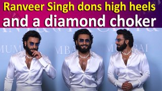 Ranveer Singh complements his all-white attire with high heels and a diamond choker