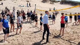 Prince William joins in a game of volleyball