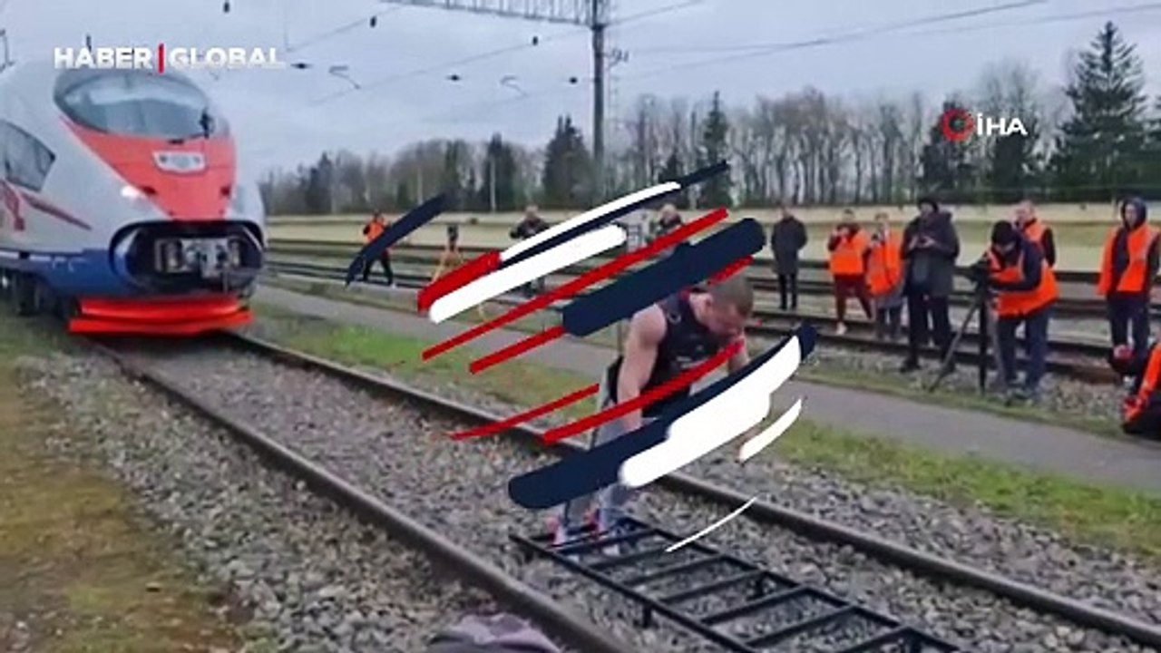 Rus atletten dünya rekoru! 650 ton ağırlığındaki treni 37 saniyede çekmeyi başardı