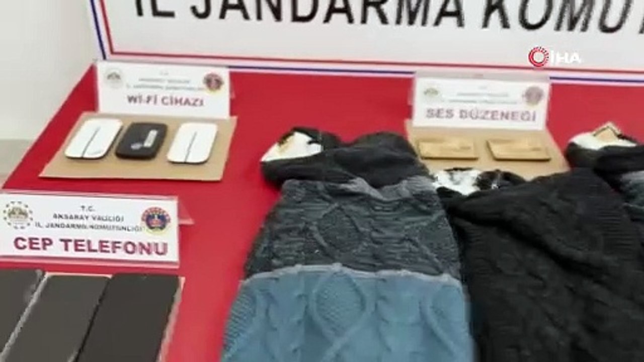 Kıyafet içine gizledikleri düzenekle ehliyet sınavına girdiler