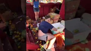 Man Slips and Falls While Climbing Down Stairs in Parade Float