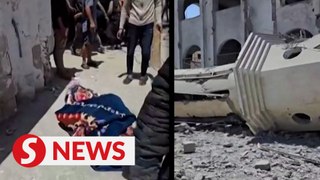 Bodies lie outside mosque as Israeli forces mass on Rafah's outskirts