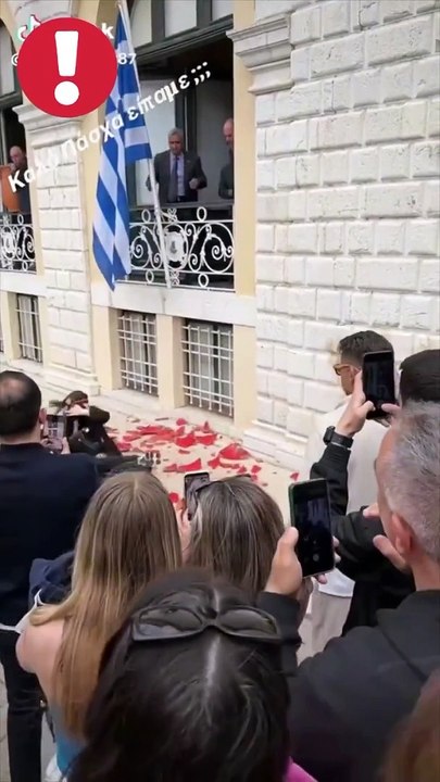 Woman walks right in the middle of a vase breaking ceremony