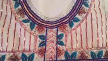 Hand embroidery. Neck design for dresses and blouses