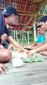 eating with friends in an old hut