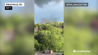 Tornado sends debris flying over homes