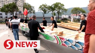 Dragon boat market in E China's Zhejiang booms on festival demand