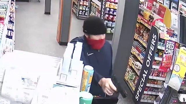 Robbers armed with imitation gun and knife raid service station