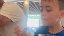 Little boy battles with a briny intruder in the all-you-can-eat arena