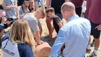 Prince William oversees a surf life saving club resusitation exercise at Fistral Beach