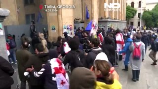 Clashes erupt in Georgia as divisive bill passes
