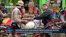 Distribusi Bantuan Banjir Menggunakan Motor