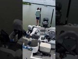Guy Tumbles Off Boat After Person Deploys Hydraulic Anchor Poles Into Water