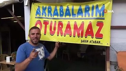 Akrabalarına isyan etti, iş yerine bu afişi astı