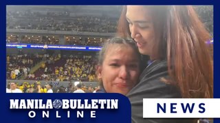 NU team captain Pangilinan and former NU star Jaja Santiago share a moment after Lady Bulldogs bagged the championship