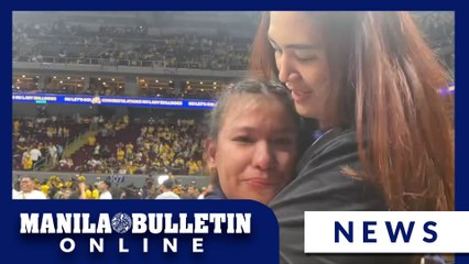 NU team captain Pangilinan and former NU star Jaja Santiago share a moment after Lady Bulldogs bagged the championship