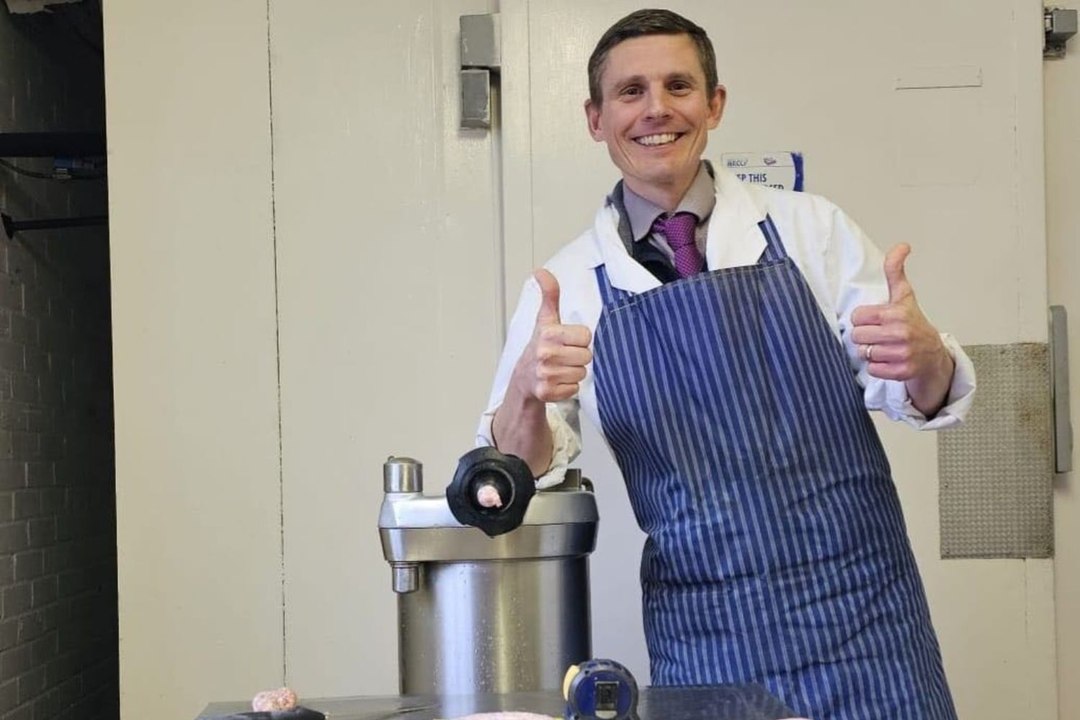 Watch village butcher demonstrate his record-breaking sausage-making technique