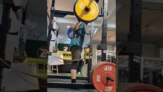 Man Attempting Heavy Squat Loses Balance and Drops Barbell