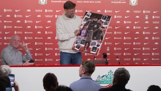 Klopp receives round of applause from media, presented with gift and leaving shot