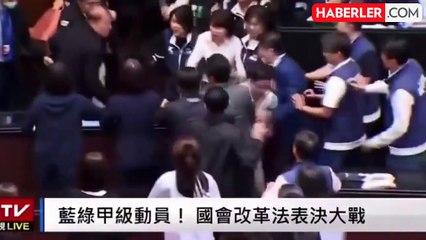 Tayvan meclisinde ilginç anlar! Tasarının geçmesini engellemek için oylama kağıdını alıp kaçtı