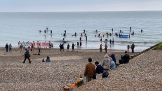 Surfers Against Sewage Paddle-Out protest in Hastings, East Sussex, on May 18 2024