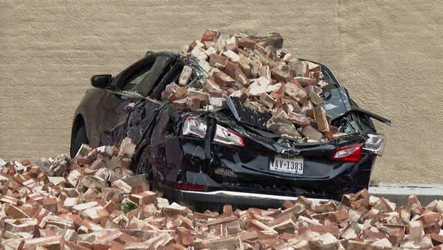 Car crushed by fallen bricks as severe thunderstorm causes widespread damage in Houston