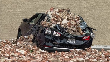 Car crushed by fallen bricks as severe thunderstorm causes widespread damage in Houston