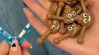 Smiley Poop Slingshot Toy