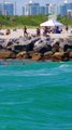 New recruits at Miami Dade Fire Rescue Ocean Division practicing inside of the notorious Haulover Inlet and beach in Miami Florida