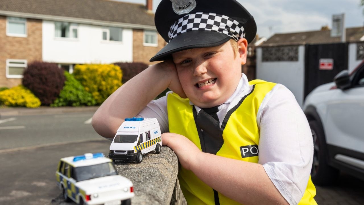 Autistic lad wears police outfit to keep town safe