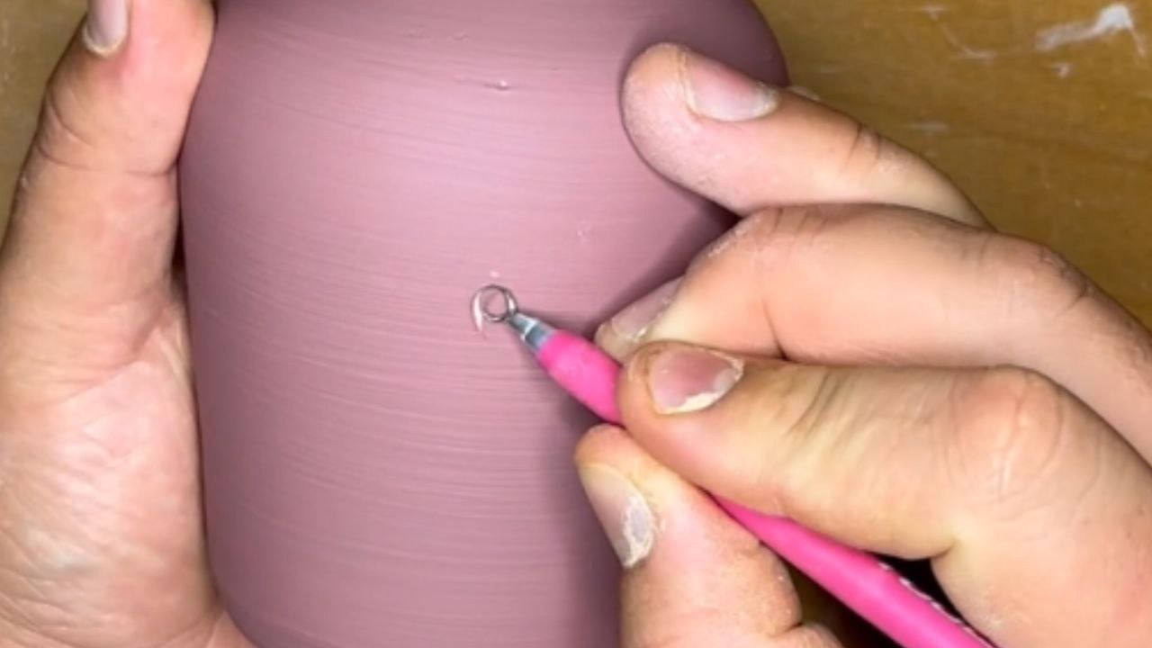Loop tool transforms a plain oil bottle into a functional art piece