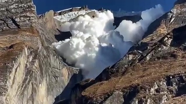 Breathtaking Avalanche at Kapuche Lake Nepal