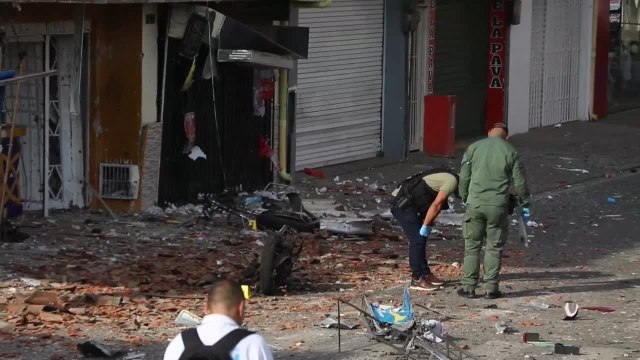 Dos policías muertos y 50 millones de pesos robados