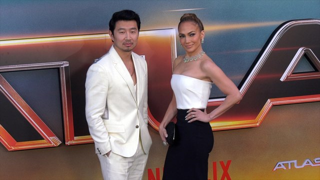 Simu Liu and Jennifer Lopez attend Netflix's Atlas Los Angeles premiere black carpet