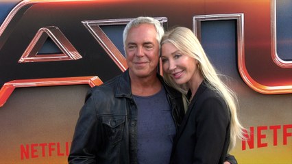 Titus Welliver and Samantha Edge attend Netflix's "Atlas" Los Angeles premiere black carpet