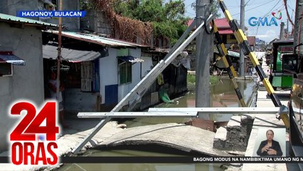 Poste ng kuryente sa gitna ng sapa, pinangangambahan magdulot ng aksidente | 24 Oras