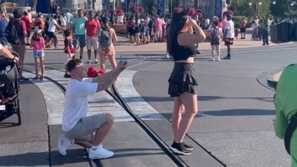 Heartfelt proposal unfolds in the fairy-tale ambiance of Disney's Magic Kingdom