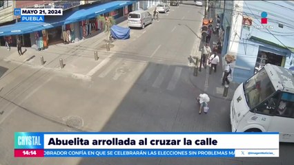 Abuelita sufre accidente al cruzar la calle