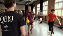 Brisbane Lions players team up with Queensland Ballet to help dancers prepare for latest production