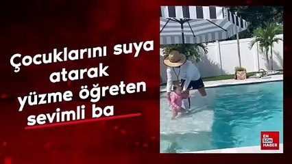 Çocuklarını suya atarak yüzme öğreten sevimli baba