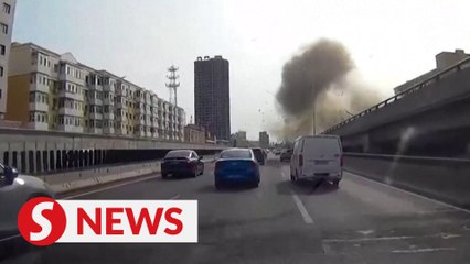 Eyewitness video shows moment of explosion at apartment building in China's Harbin