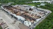 Fresh aerial footage over the Super Smart Service building, Cannock, which was destroyed by fire exactly two weeks ago.