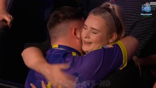 Luke Littler fights back tears as he celebrates historic Premier League Darts final win with kiss from girlfriend
