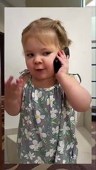 Cute baby talking On phone